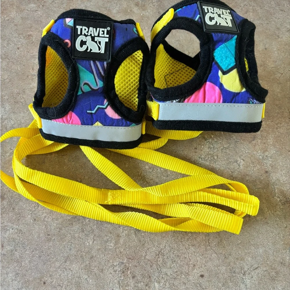 Two Harness and Leash Sets - Black, Yellow, and Multicolor